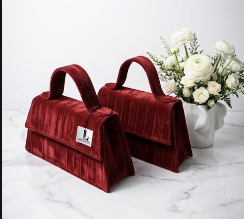 Triangular velvet handbag