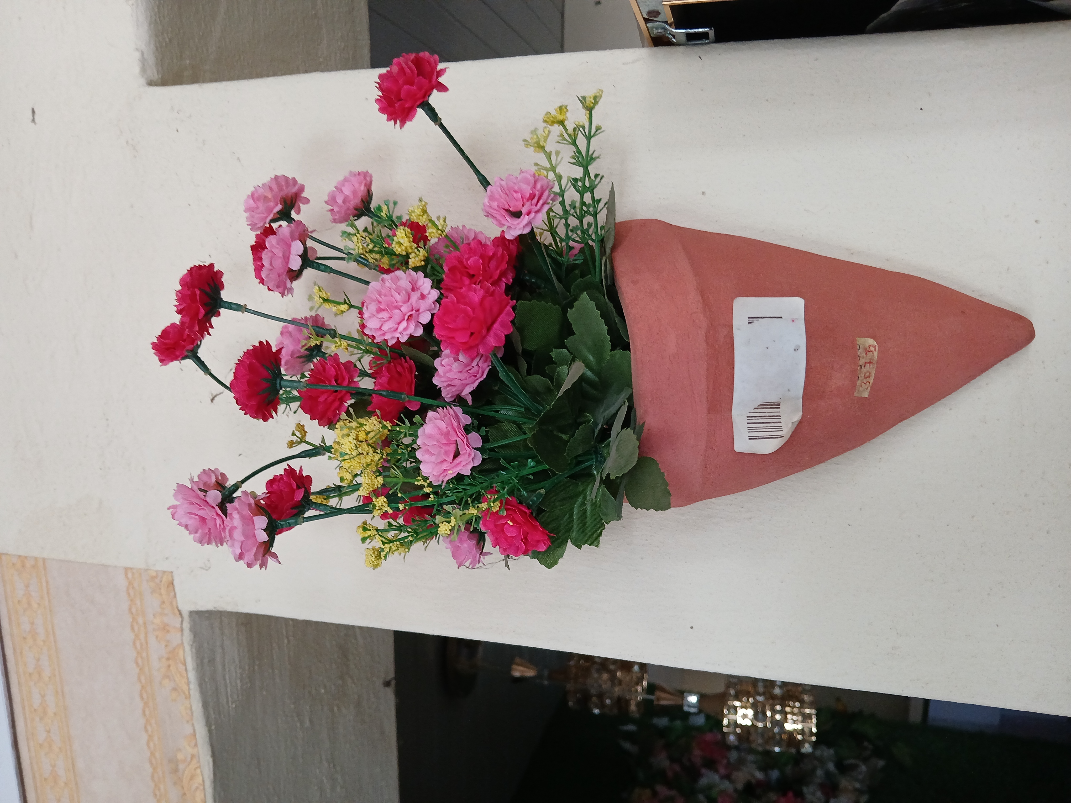 Artificial Flower In Clay Wall Vase image