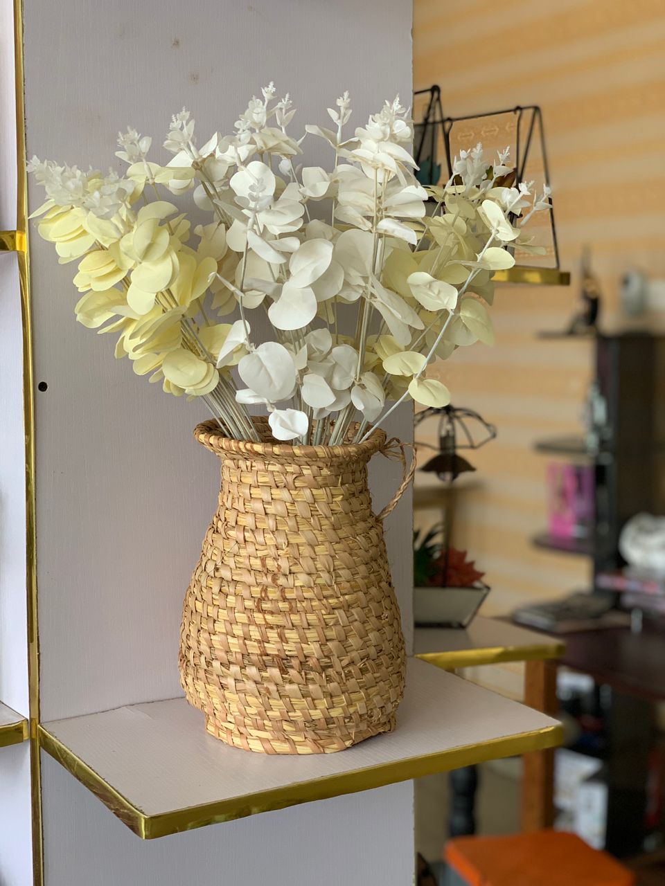 Artificial Eucalyptus Flower In 10" Woven Basket image