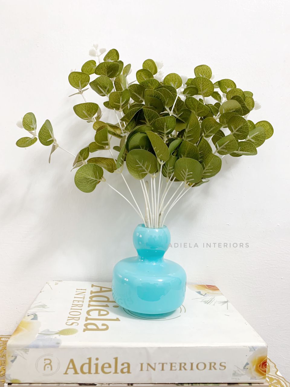 Eucalyptus flower In Blue Glass Vase image