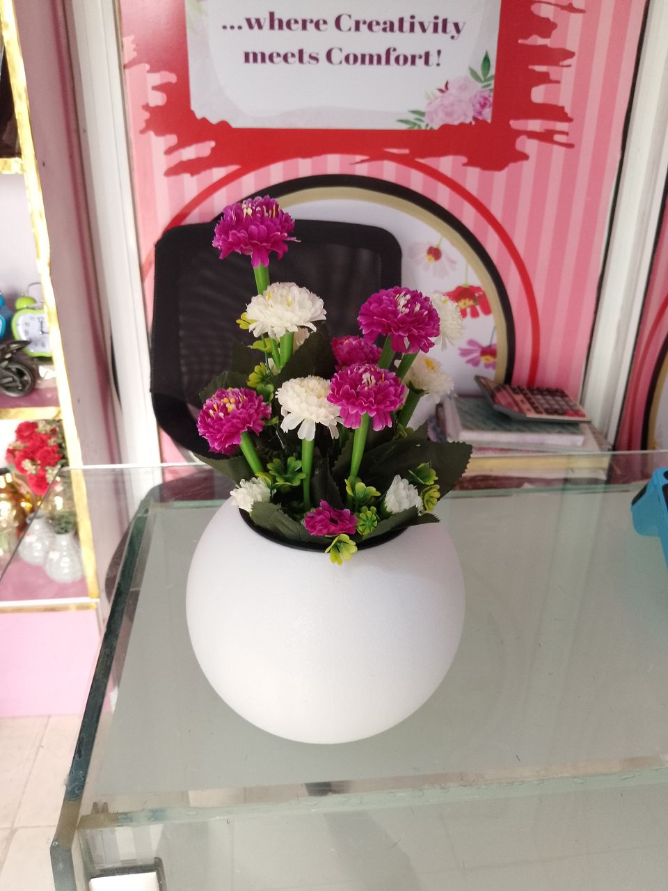 Artificial Flower In Plastic Table Planter image