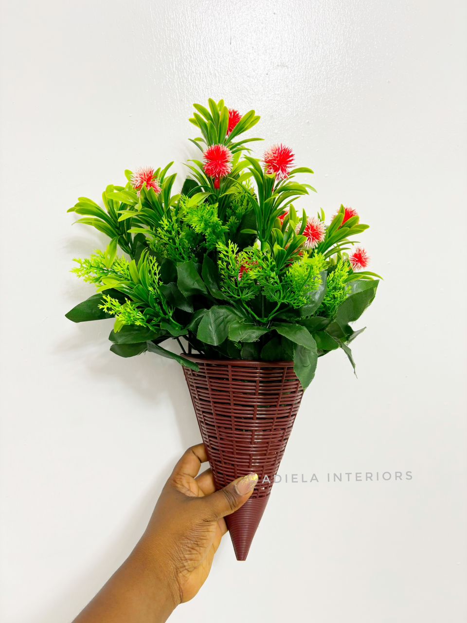 Artificial Flower In Plastic Wall Vase image