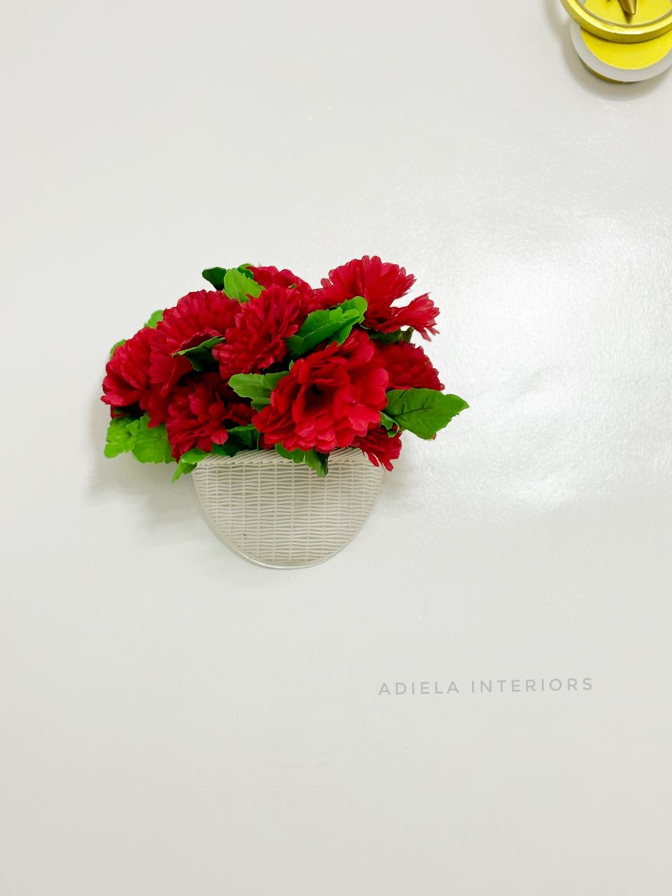 Artificial Flower In Plastic Wall Vase image