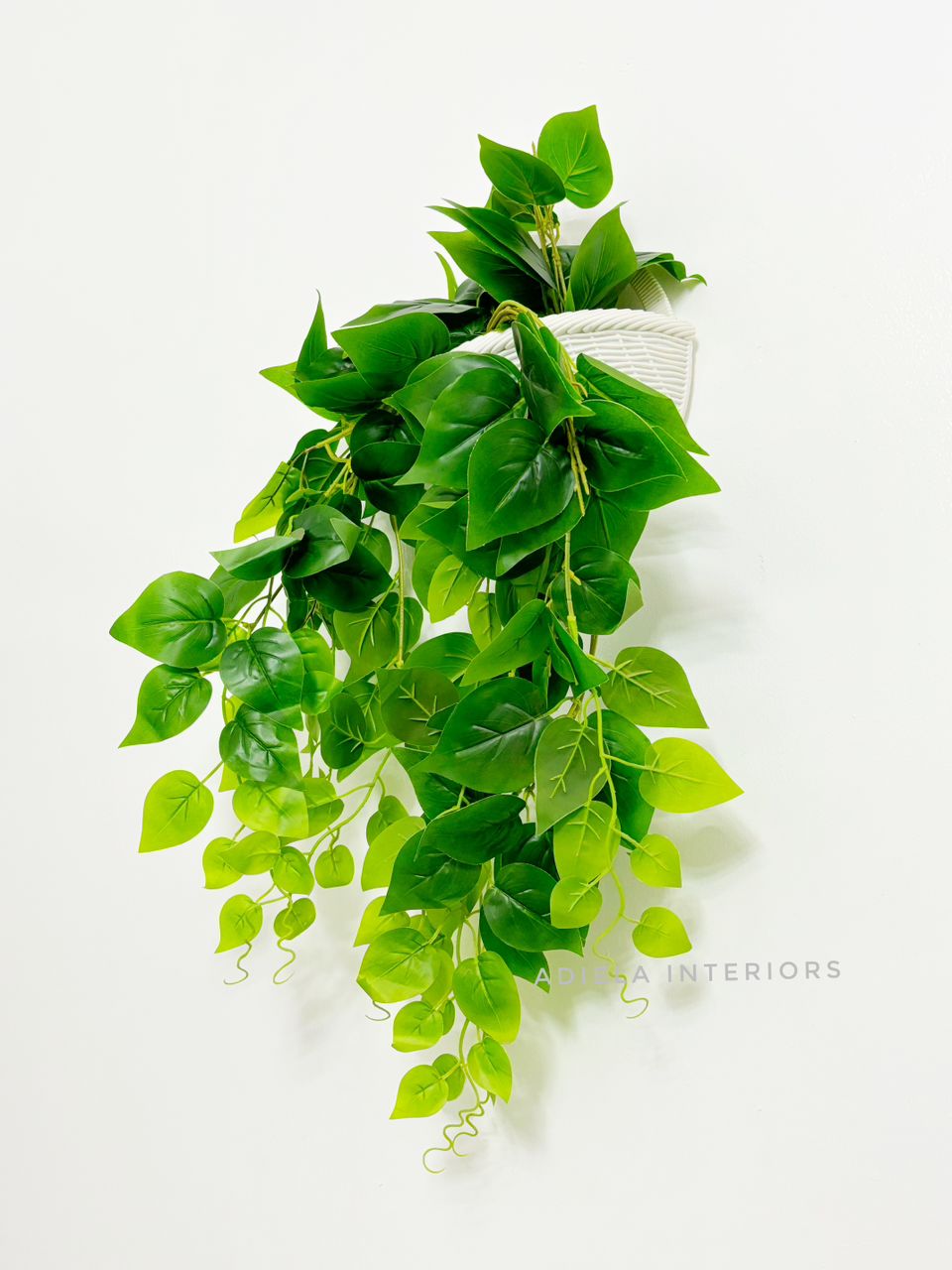 Artificial Flower In Plastic Wall Vase image