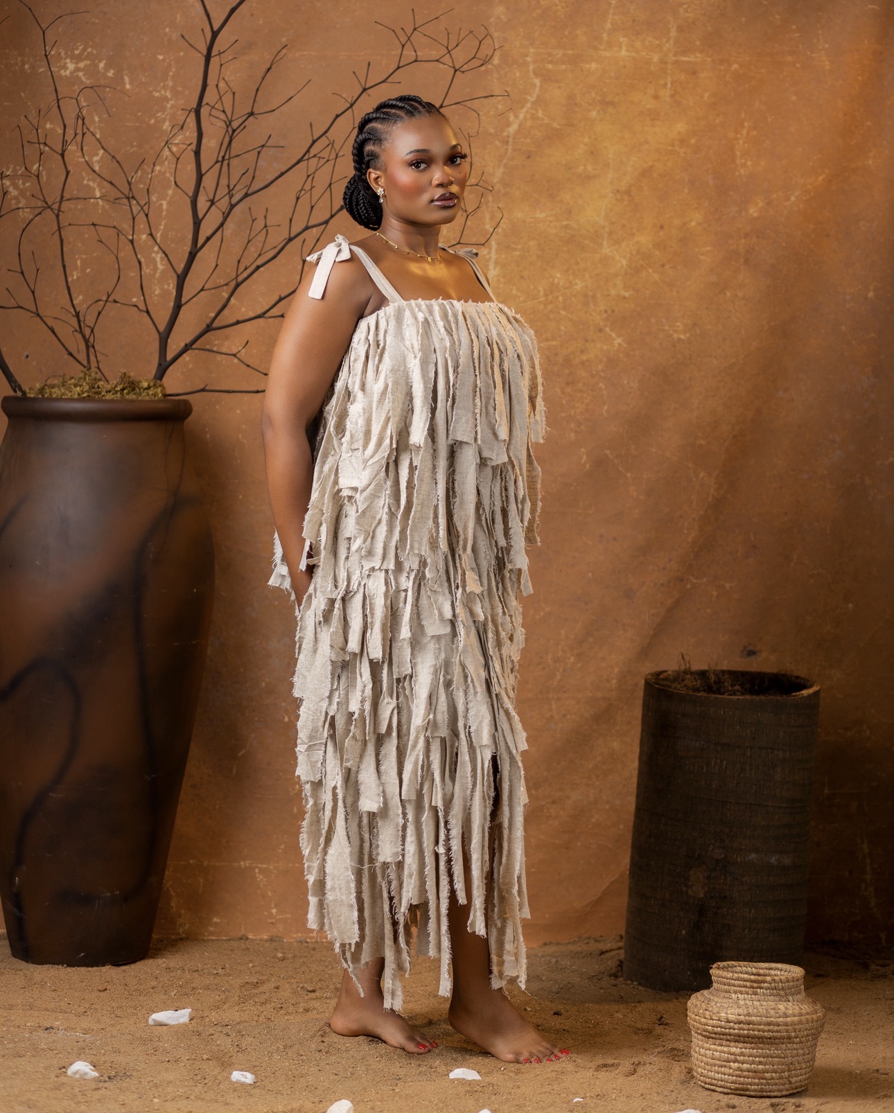THE AMARÀ TASSEL STATEMENT DRESS