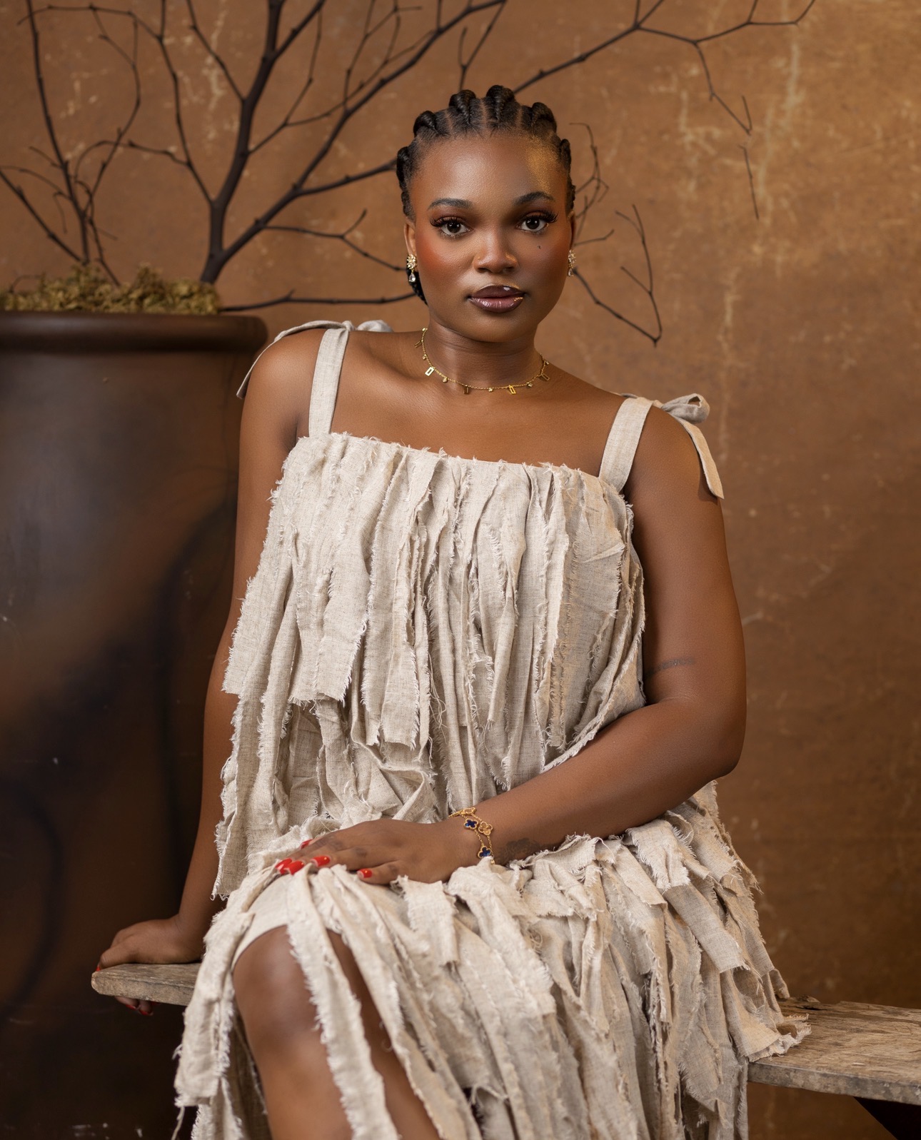 THE AMARÀ TASSEL STATEMENT DRESS
